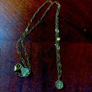 Bracha necklace with tiny cross on circle on both sides